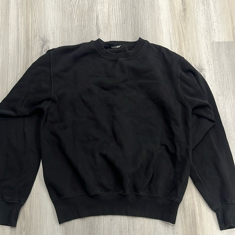 Black crewneck sweatshirt